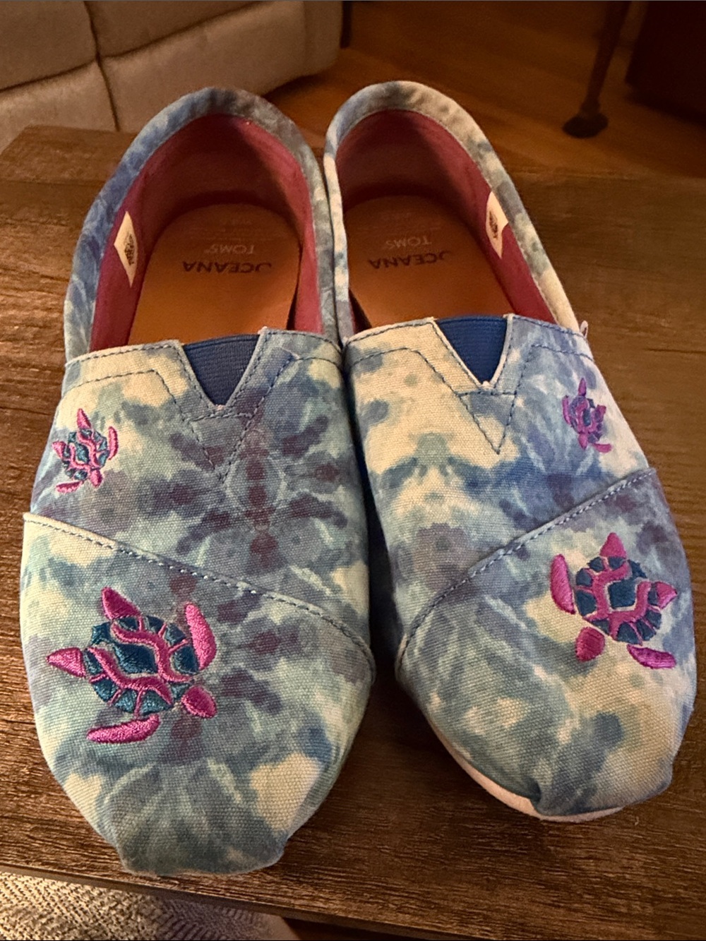 Toms Women's Blue Tie-Dye Canvas Slip-Ons with Pink Turtle Embroidery